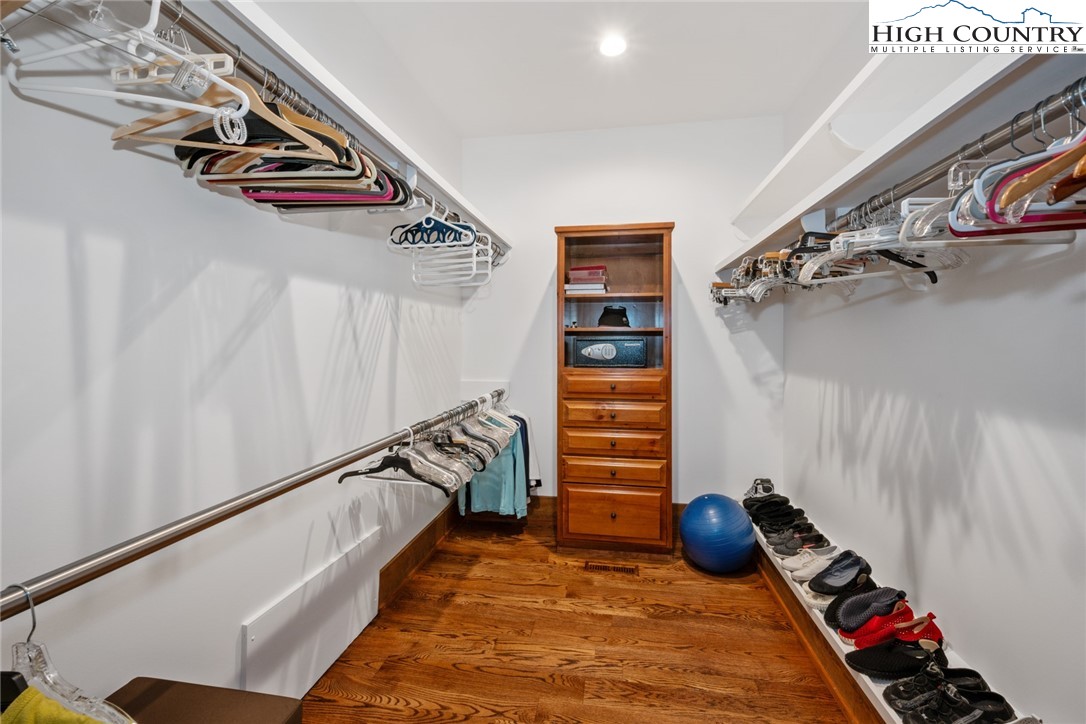 171 Balsam Road Linville, NC 28646 - Photo 25 of 49 a view of walk in closet with clothes and shoes