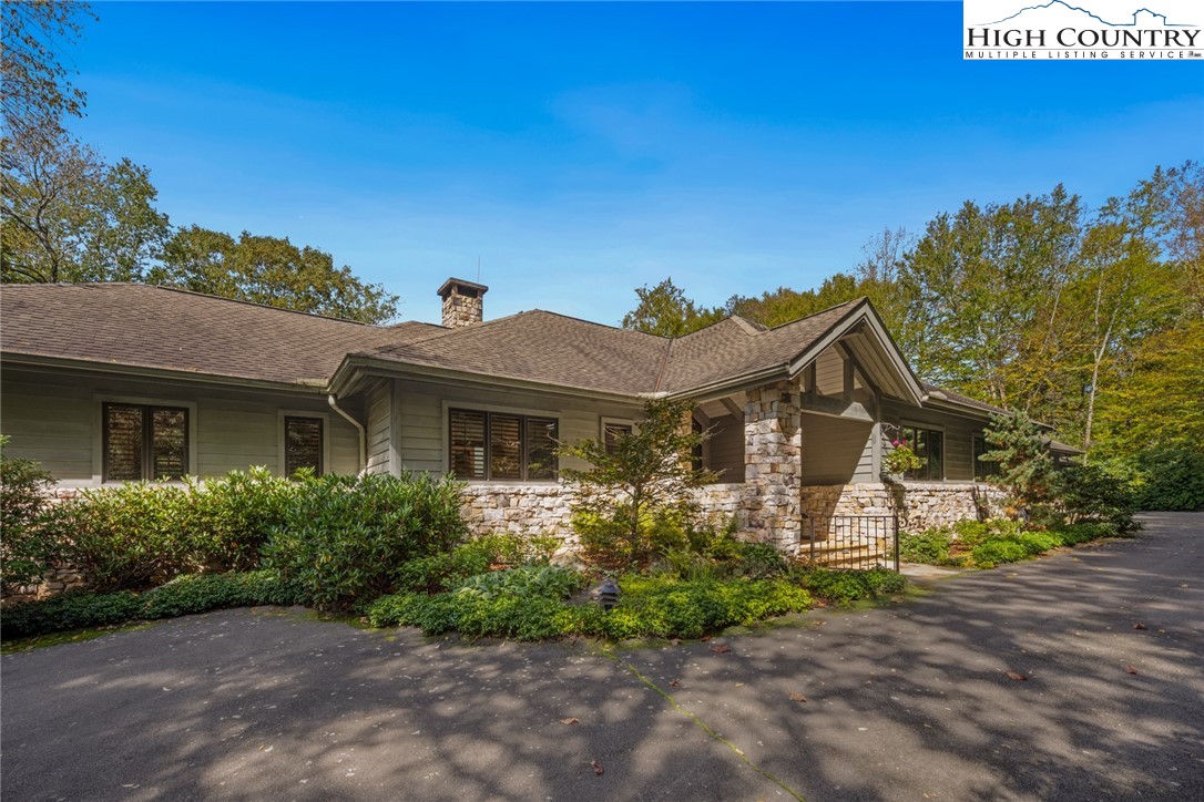 171 Balsam Road Linville, NC 28646 - Photo 40 of 49 a front view of a house with garden