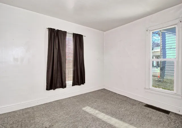 a view of livingroom with hardwood floor and window