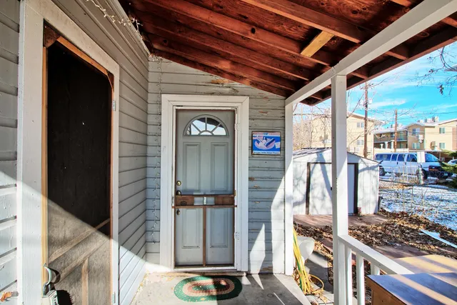 a view of living room with wooden floor