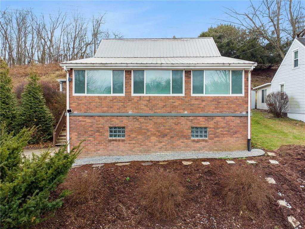 2052 McKinney Road Monroeville, PA 15146 - Photo 5 of 30 a view of front of house with a yard