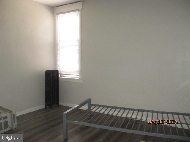 6535 Windsor Street Philadelphia, PA 19142 - Photo 9 of 14 a view of a hallway with wooden floor and a window