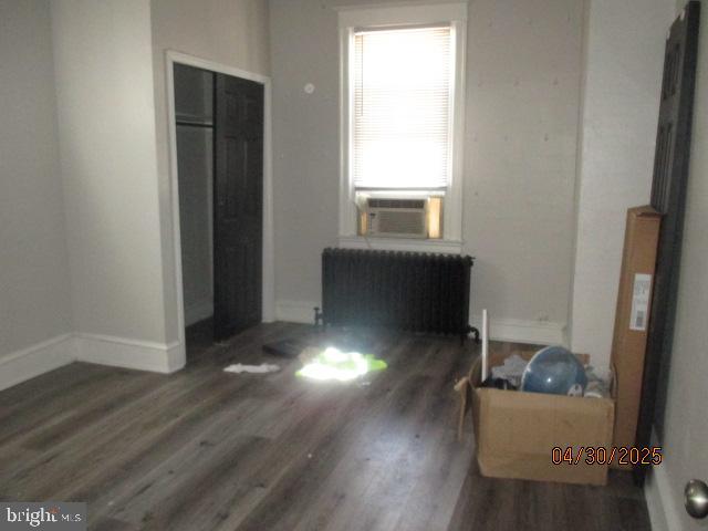 6535 Windsor Street Philadelphia, PA 19142 - Photo 10 of 14 an empty room with wooden floor and windows