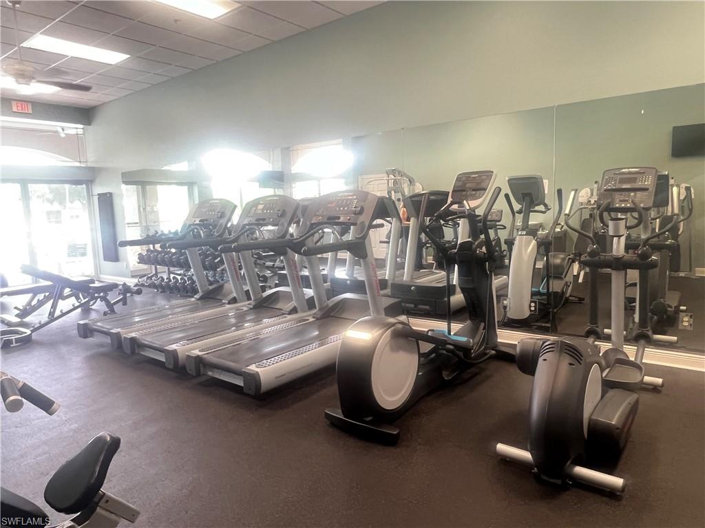 14265 Manchester Drive Naples, FL 34114 - Photo 31 of 35 a view of a room with gym equipment