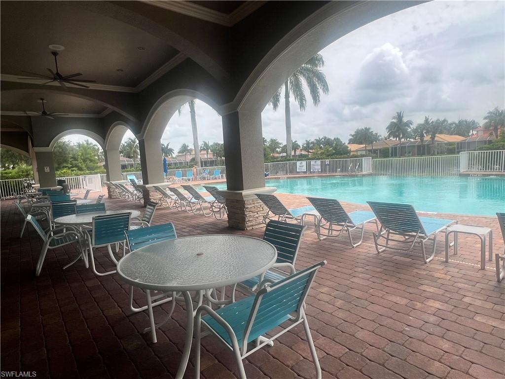 14265 Manchester Drive Naples, FL 34114 - Photo 34 of 35 an outdoor space with seating area