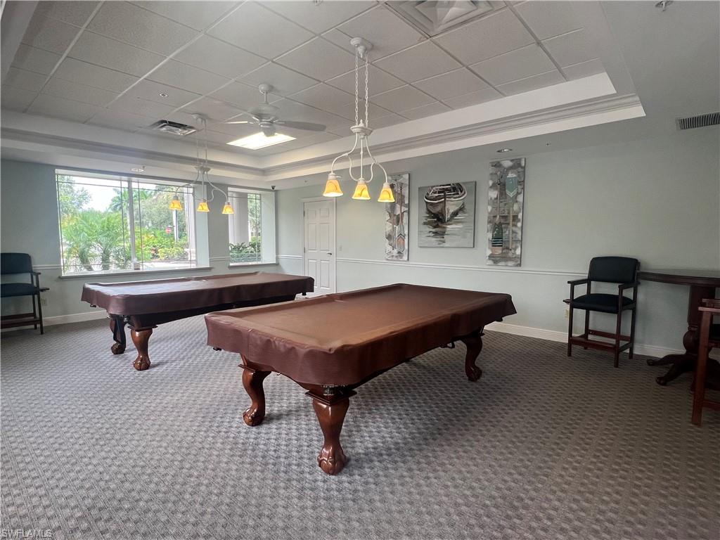 14265 Manchester Drive Naples, FL 34114 - Photo 35 of 35 a room with furniture pool table and windows