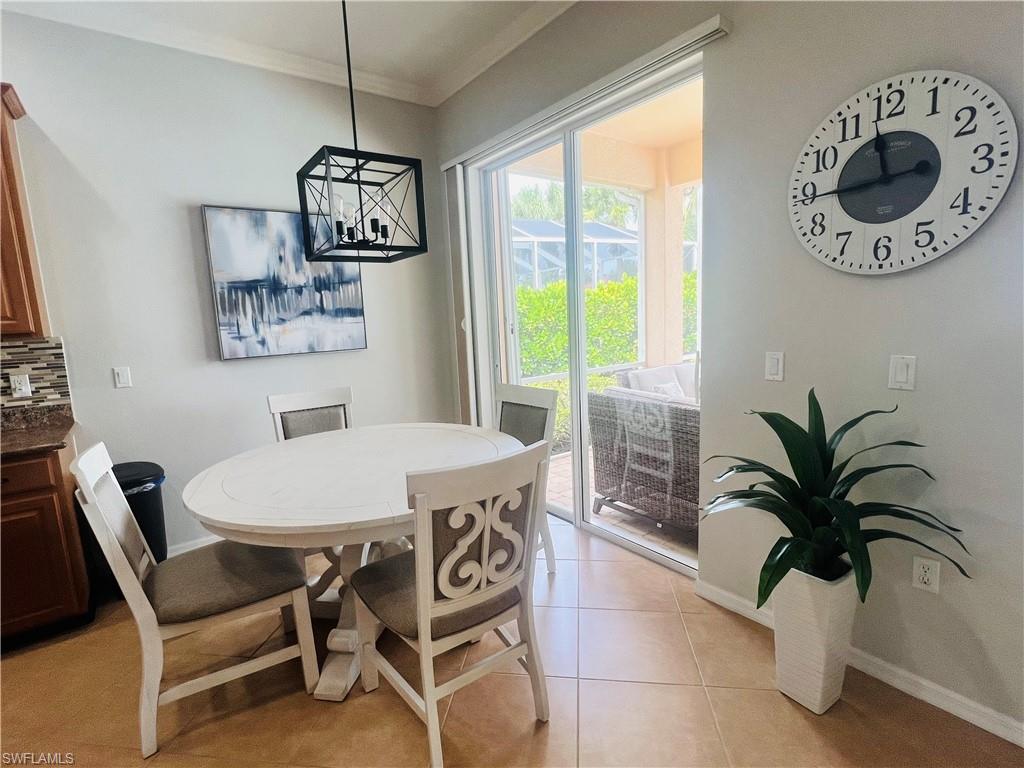 14265 Manchester Drive Naples, FL 34114 - Photo 8 of 35 a dining room with furniture and window