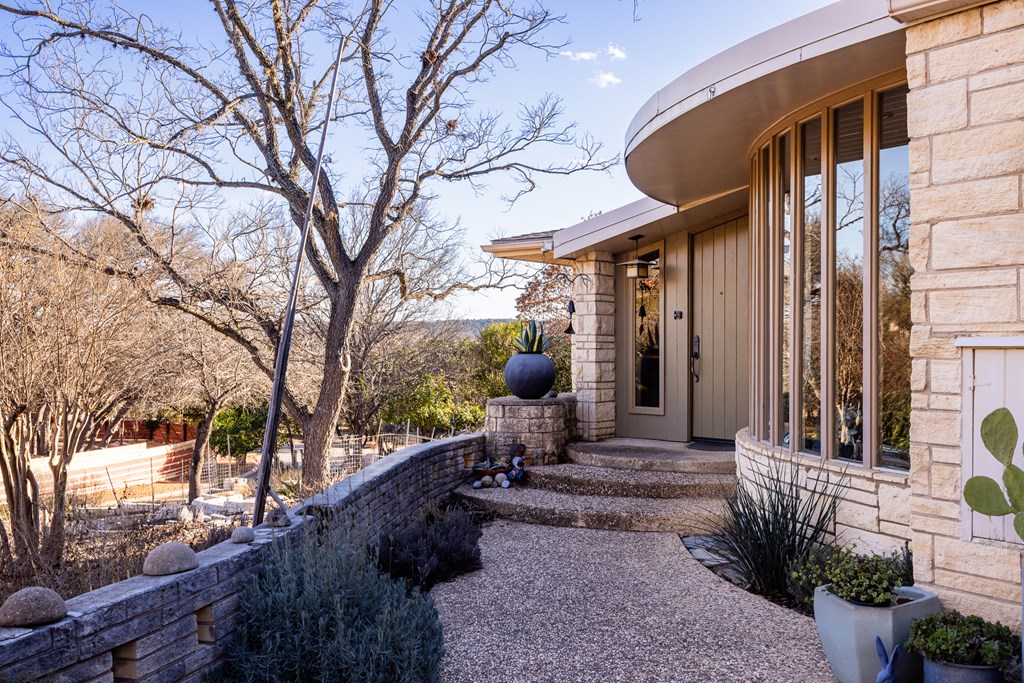 228 Galbraith Avenue Kerrville, TX 78028 - Photo 4 of 50 a view of a house with a backyard
