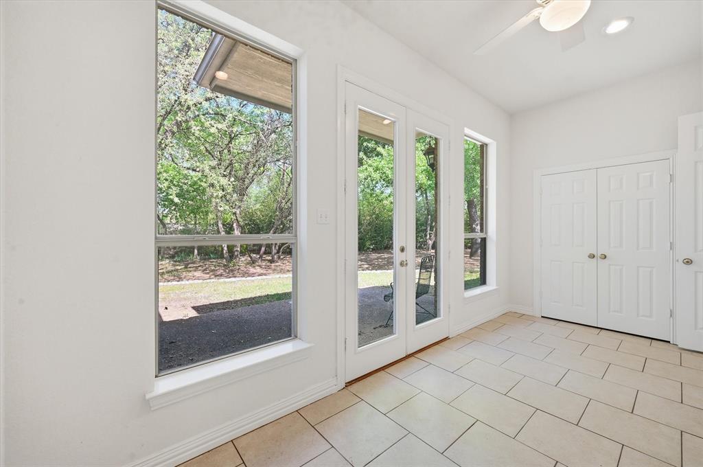 5513 Rustic Trail Colleyville, TX 76034 - Photo 9 of 40 a view of an empty room with a window