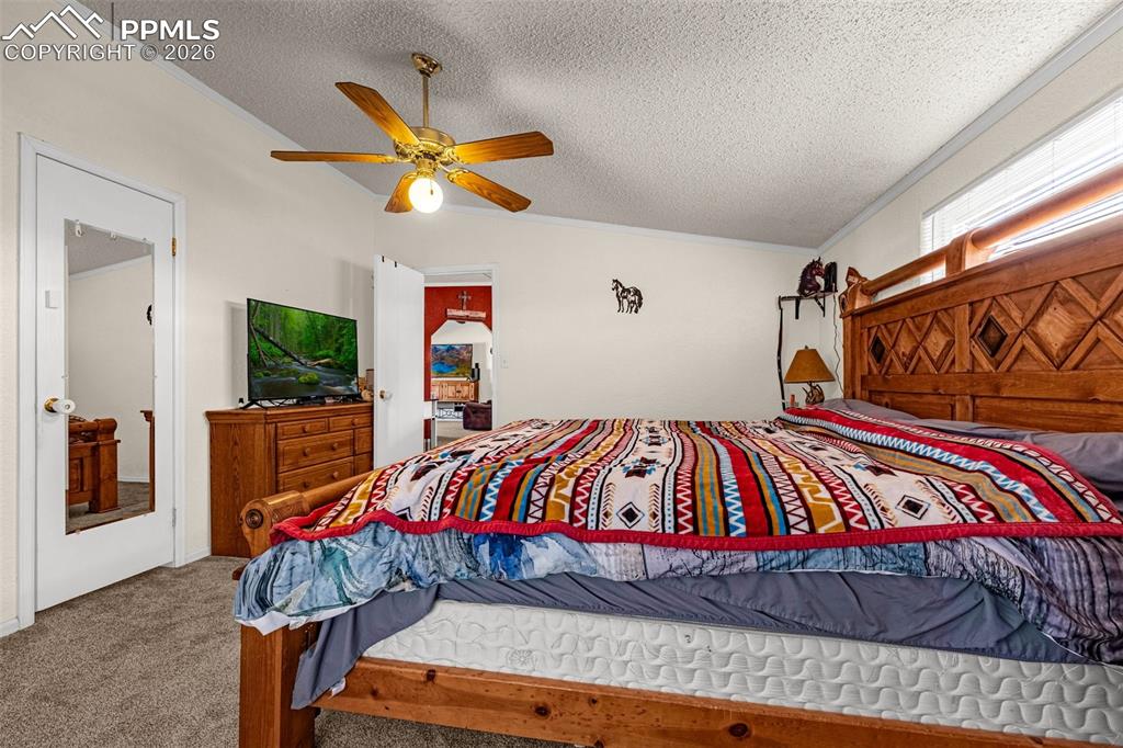 36925 Shear Road Yoder, CO 80864 - Photo 12 of 35 a bedroom with a bed and dresser