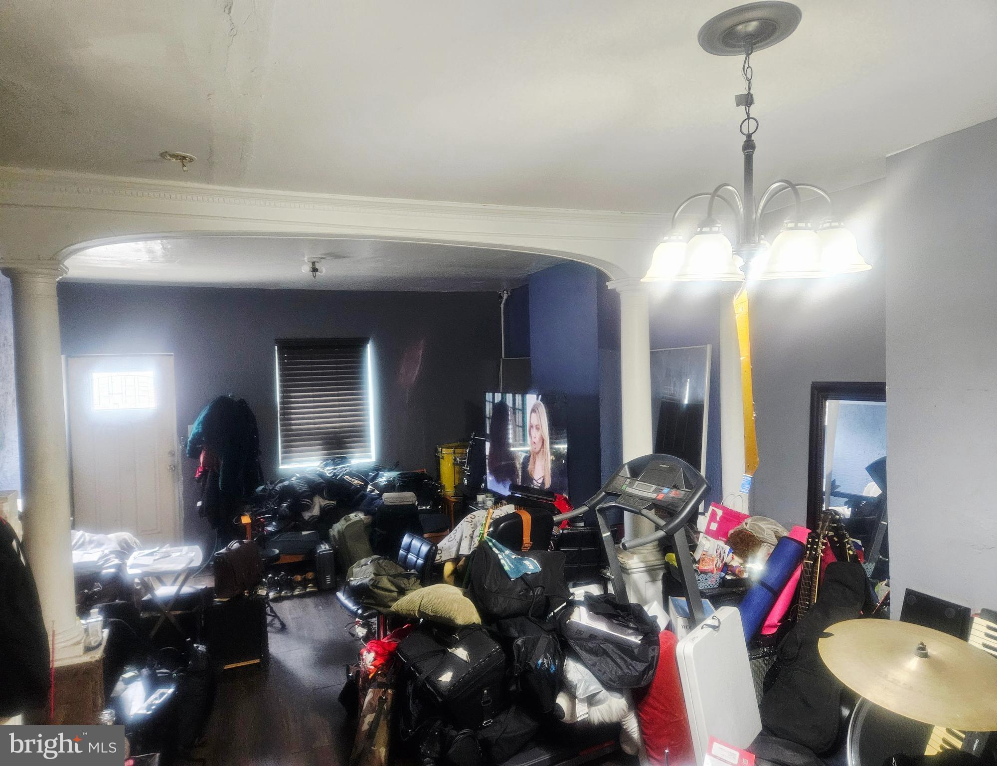 1213 South 49th Street Philadelphia, PA 19143 - Photo 4 of 8 a view of a room with gym equipment