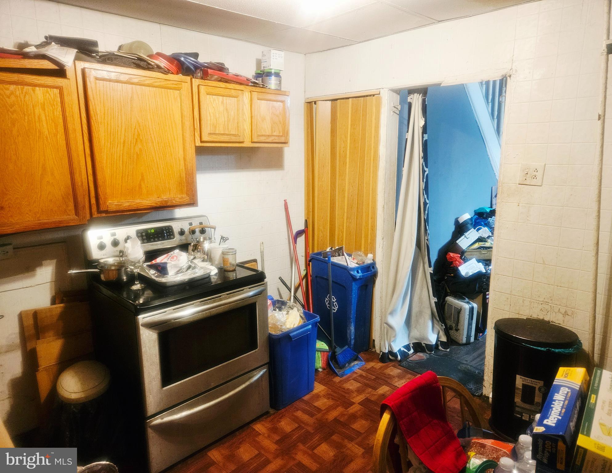 1213 South 49th Street Philadelphia, PA 19143 - Photo 5 of 8 a bedroom with a bed and a closet