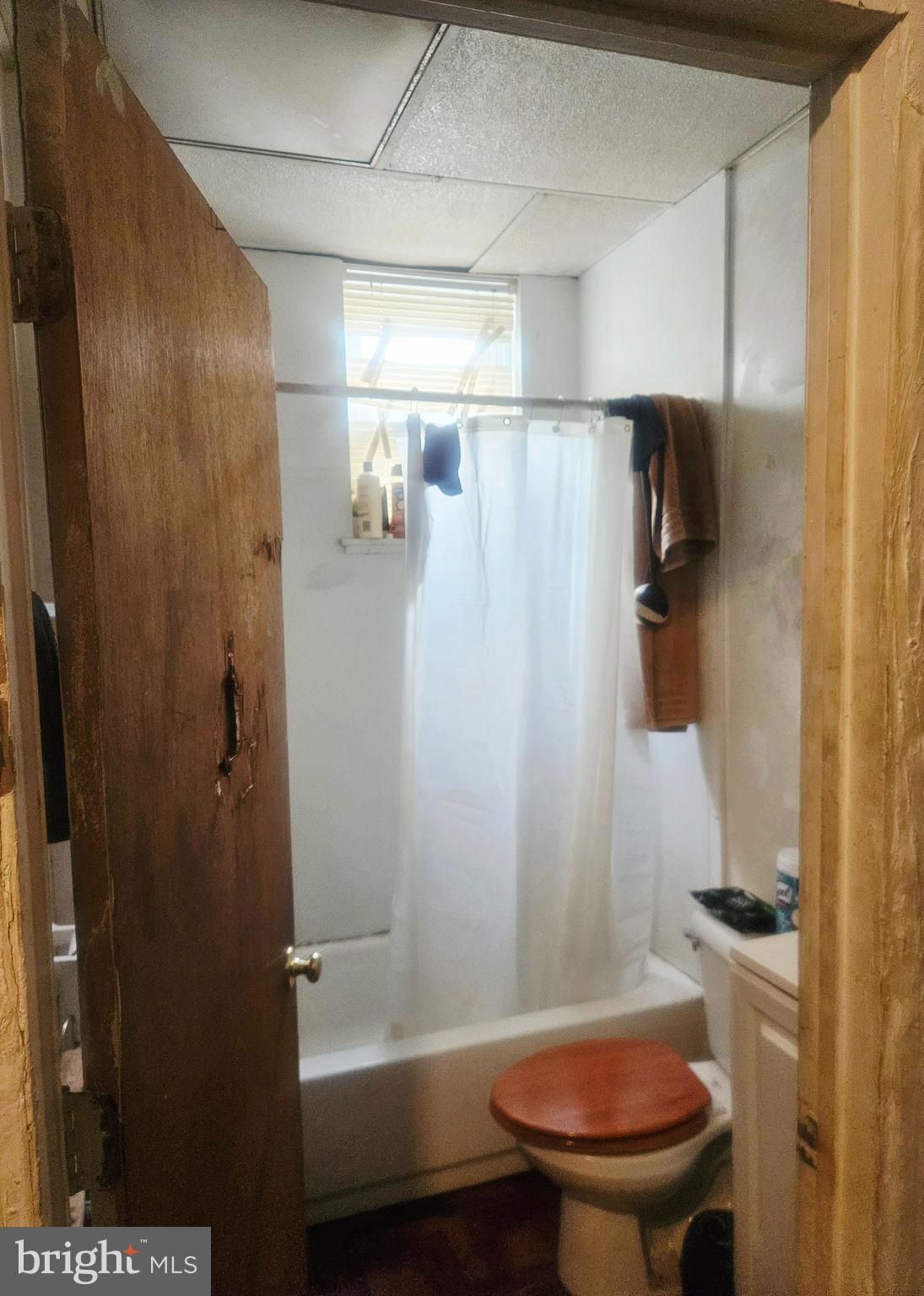 1213 South 49th Street Philadelphia, PA 19143 - Photo 6 of 8 a bathroom with a shower and a toilet