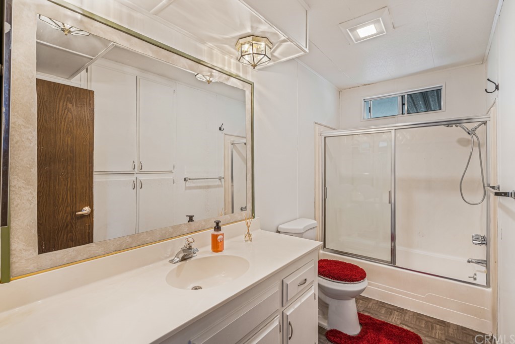 21811 Vera Street, Unit 58 Carson, CA 90745 - Photo 15 of 24 a bathroom with a sink and a mirror