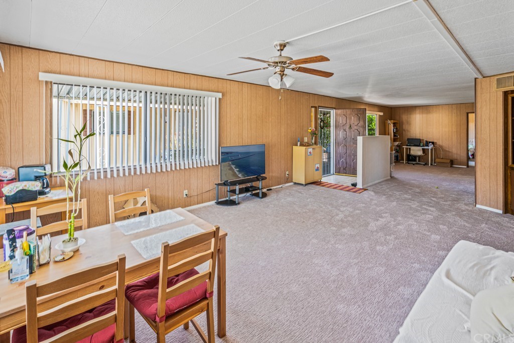 21811 Vera Street, Unit 58 Carson, CA 90745 - Photo 9 of 24 a view of a livingroom with furniture and a window
