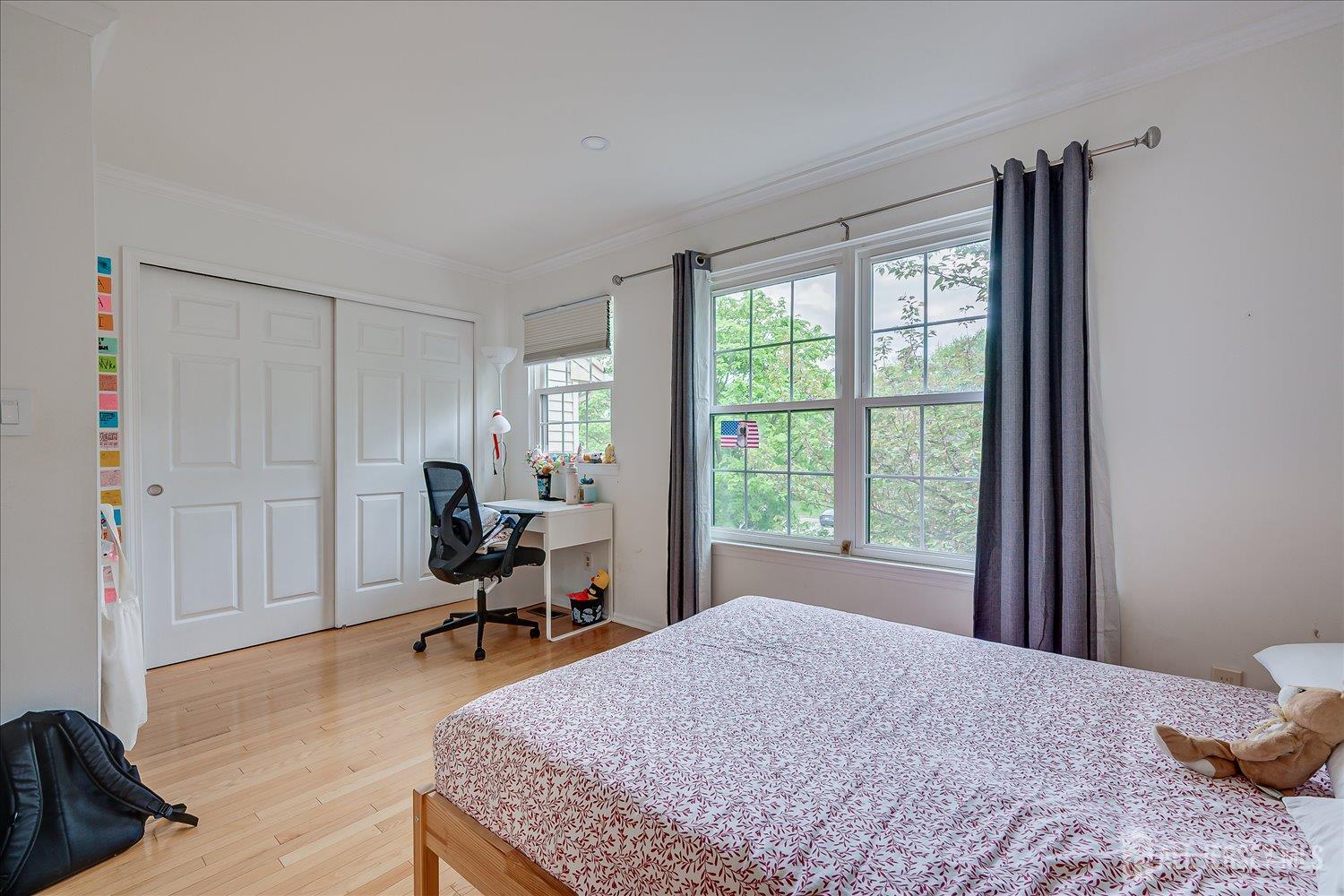 903 Maplecrest Road Edison, NJ 08820 - Photo 12 of 24 a bedroom with a bed and large windows