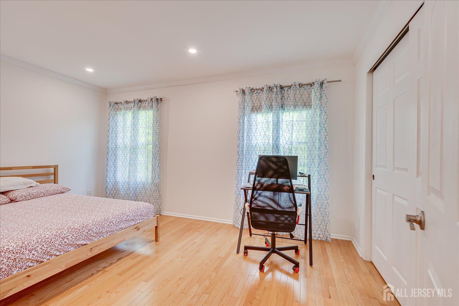 903 Maplecrest Road Edison, NJ 08820 - Photo 13 of 24 a bedroom with a bed and a window