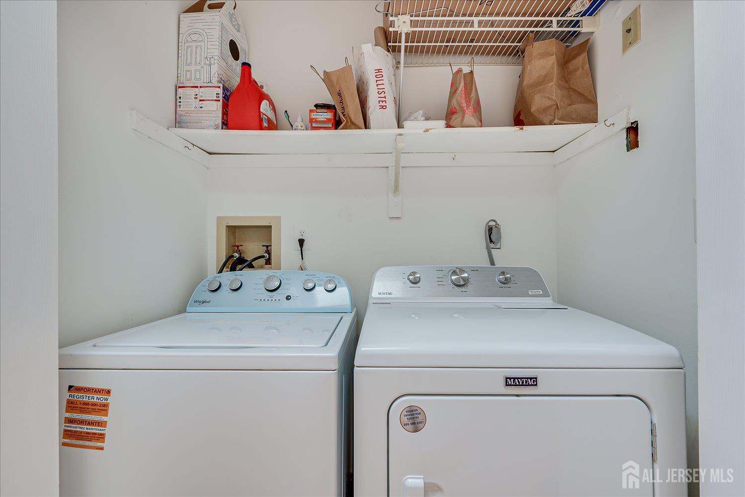 903 Maplecrest Road Edison, NJ 08820 - Photo 20 of 24 a utility room with dryer and washer