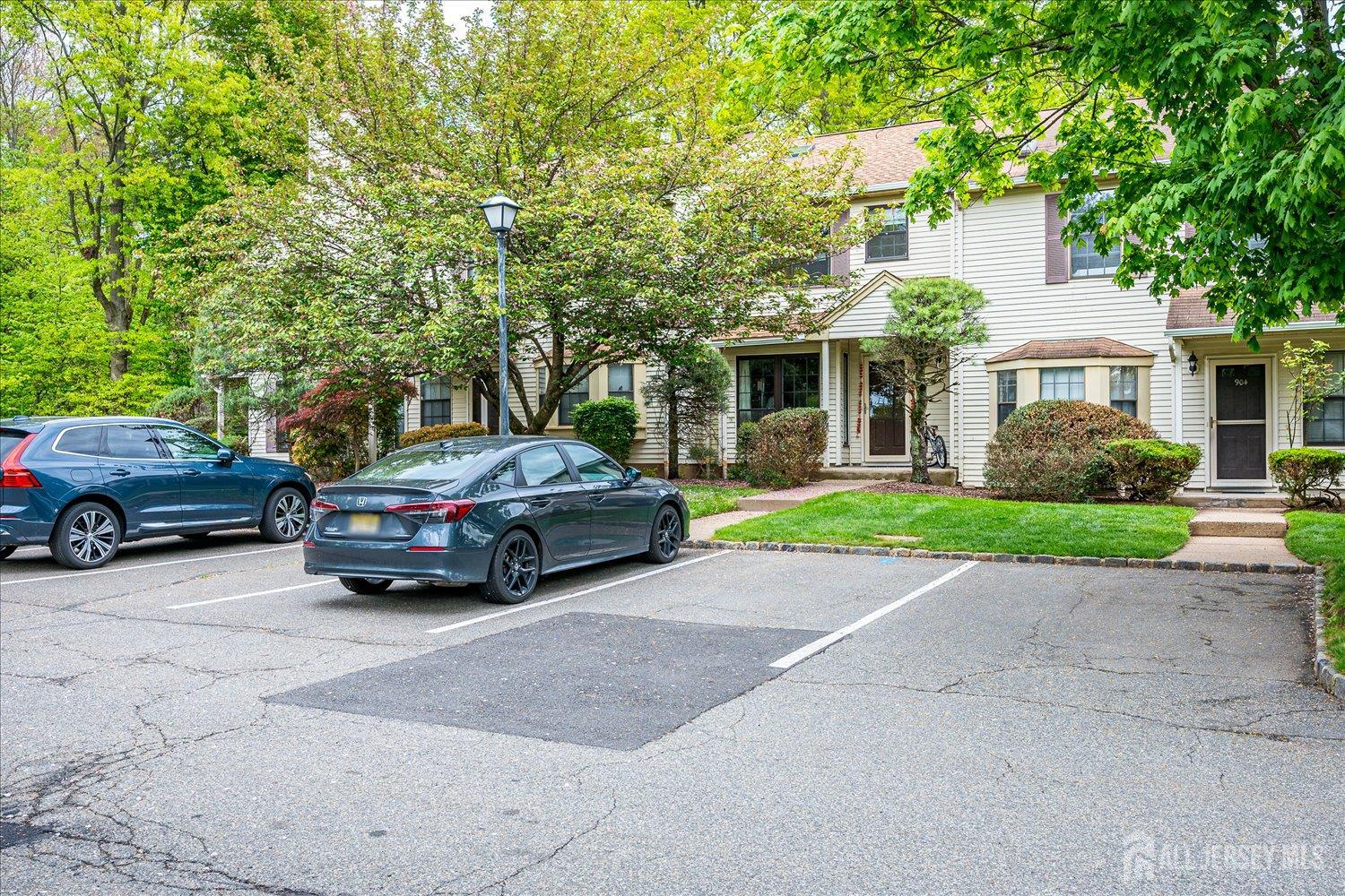 903 Maplecrest Road Edison, NJ 08820 - Photo 24 of 24 a car parked in front of a house
