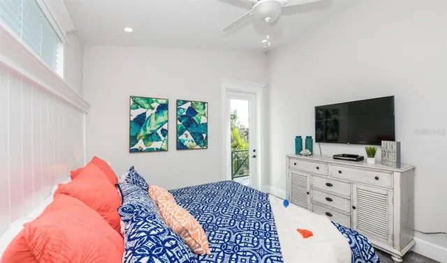 a view of swimming pool with a table and chairs