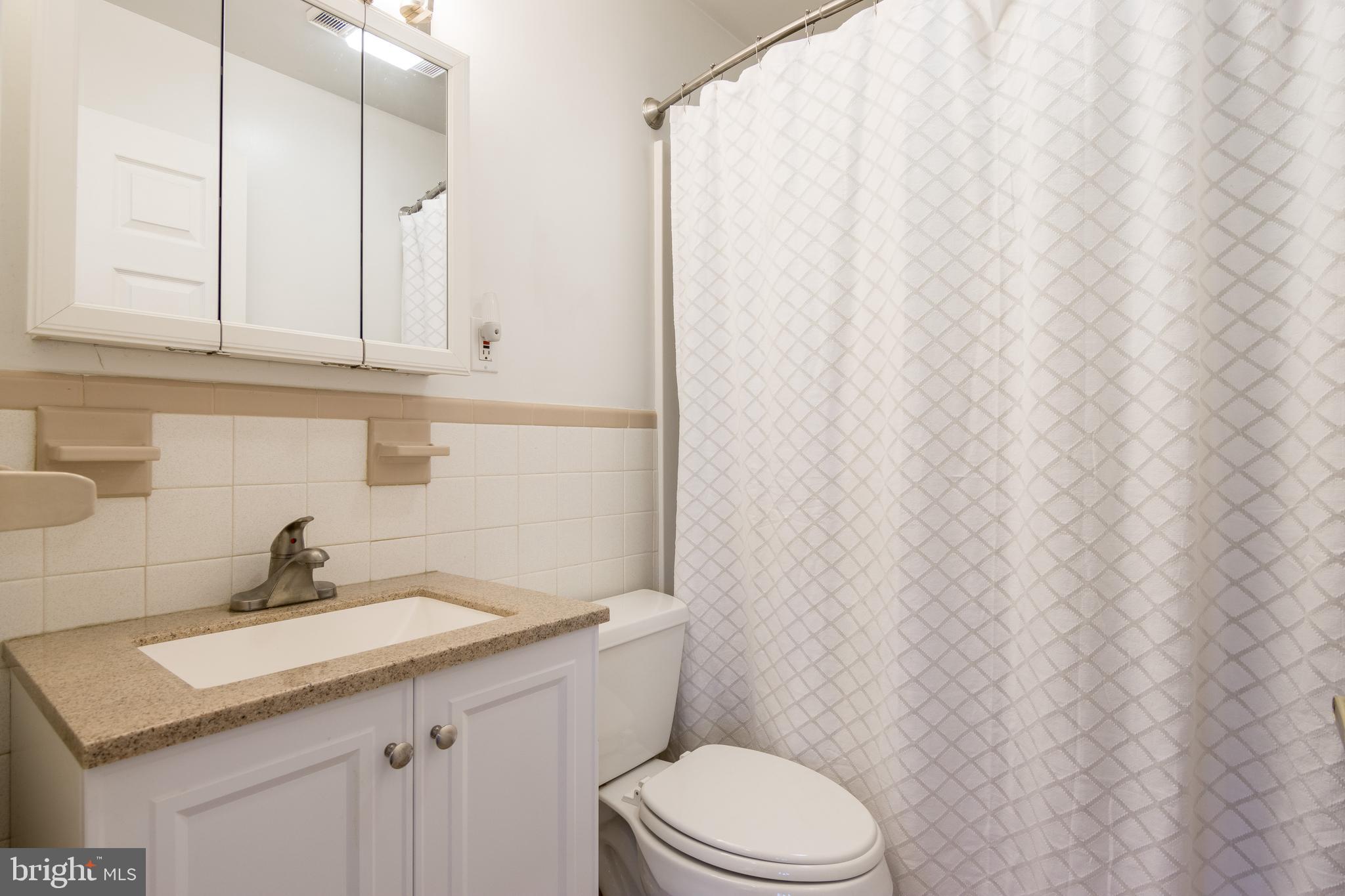 2825 Pinewick Road Ellicott City, MD 21042 - Photo 22 of 49 Hall bath with updated vanity