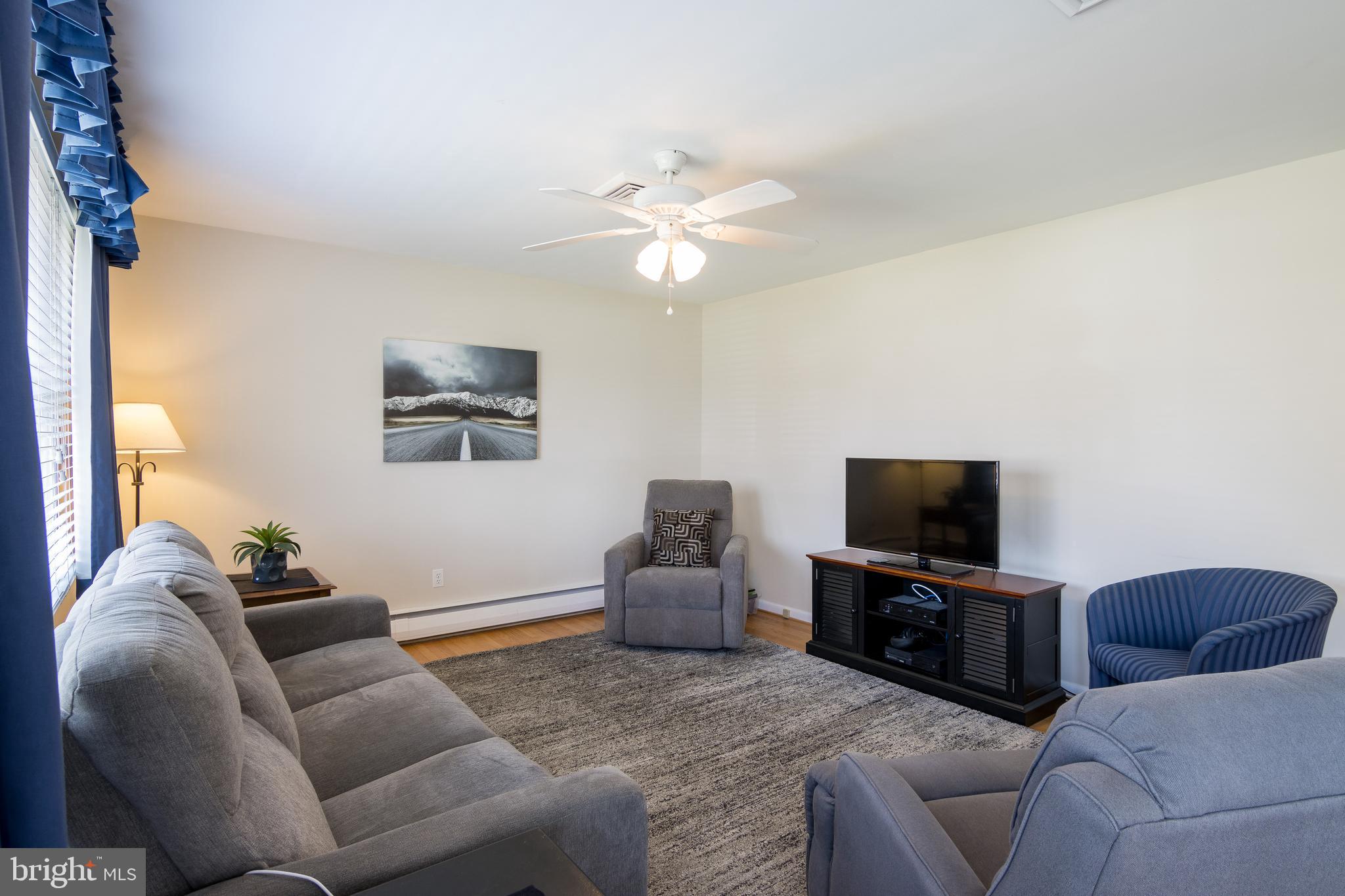 2825 Pinewick Road Ellicott City, MD 21042 - Photo 5 of 49 Living room w/gleaming HW floors