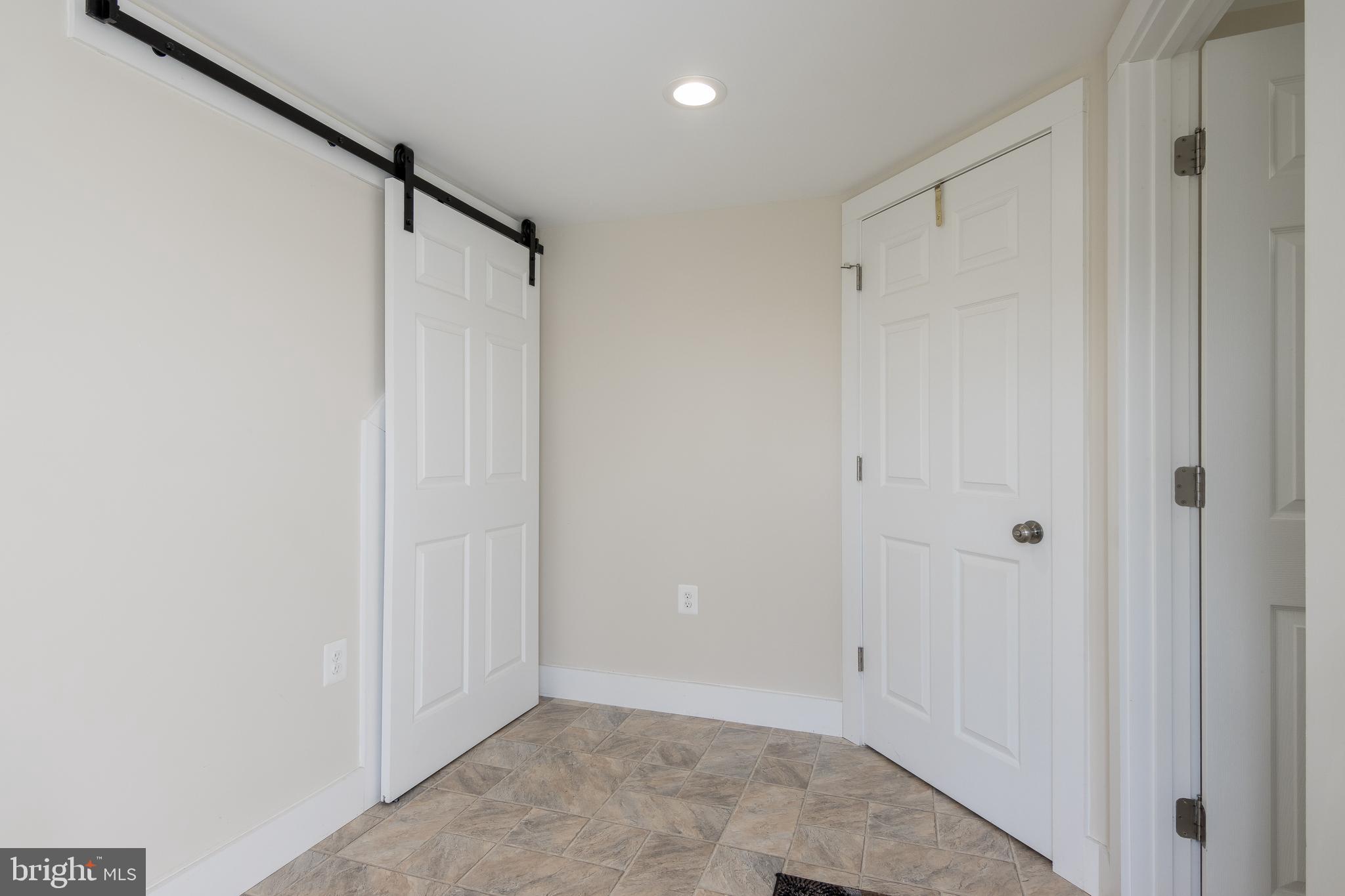 2825 Pinewick Road Ellicott City, MD 21042 - Photo 41 of 49 Storage closet w/barn door
