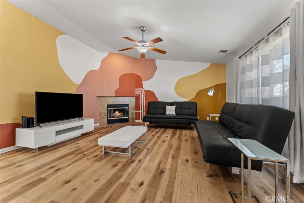 60205 Latham Trail Joshua Tree, CA 92252 - Photo 12 of 38 a living room with furniture and a flat screen tv