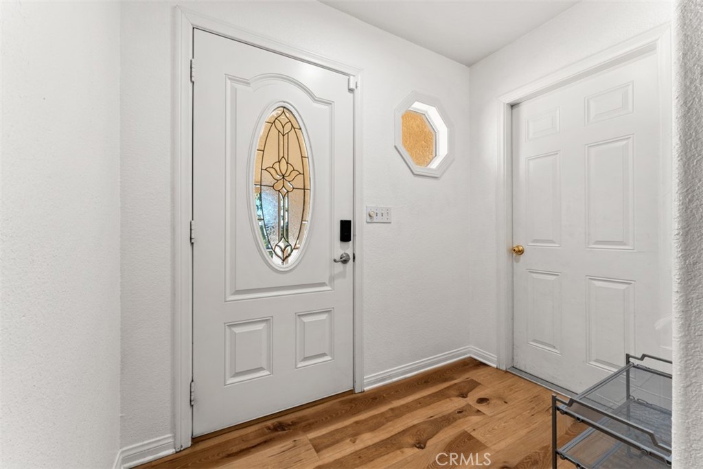 60205 Latham Trail Joshua Tree, CA 92252 - Photo 4 of 38 a view of empty room with wooden floor