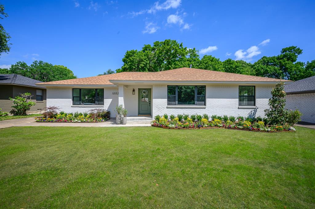 6443 Dunstan Lane Dallas, TX 75214 - Photo 1 of 1 a front view of house with yard and green space