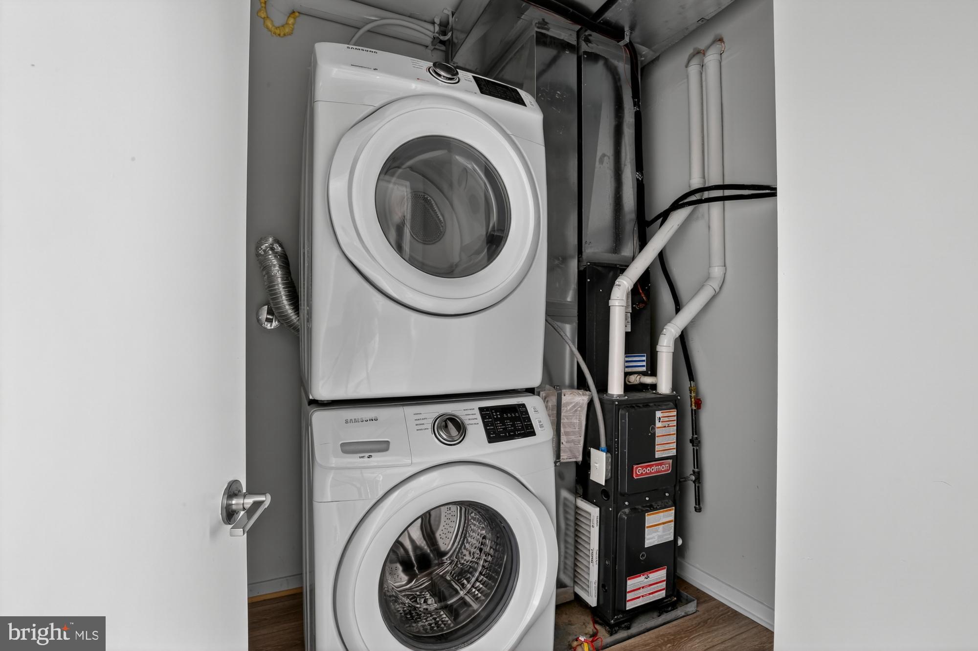 381 Martin Street, Unit 2 Philadelphia, PA 19128 - Photo 9 of 20 a view of livingroom with washer and dryer