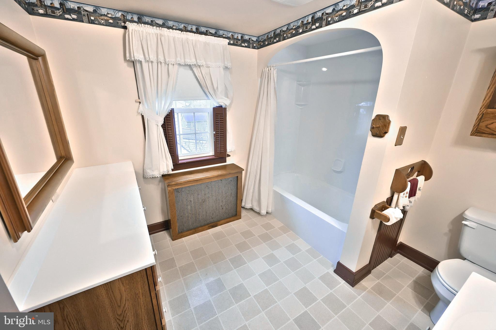 99 5th Street Hanover, PA 17331 - Photo 28 of 38 a bathroom with a sink toilet and shower