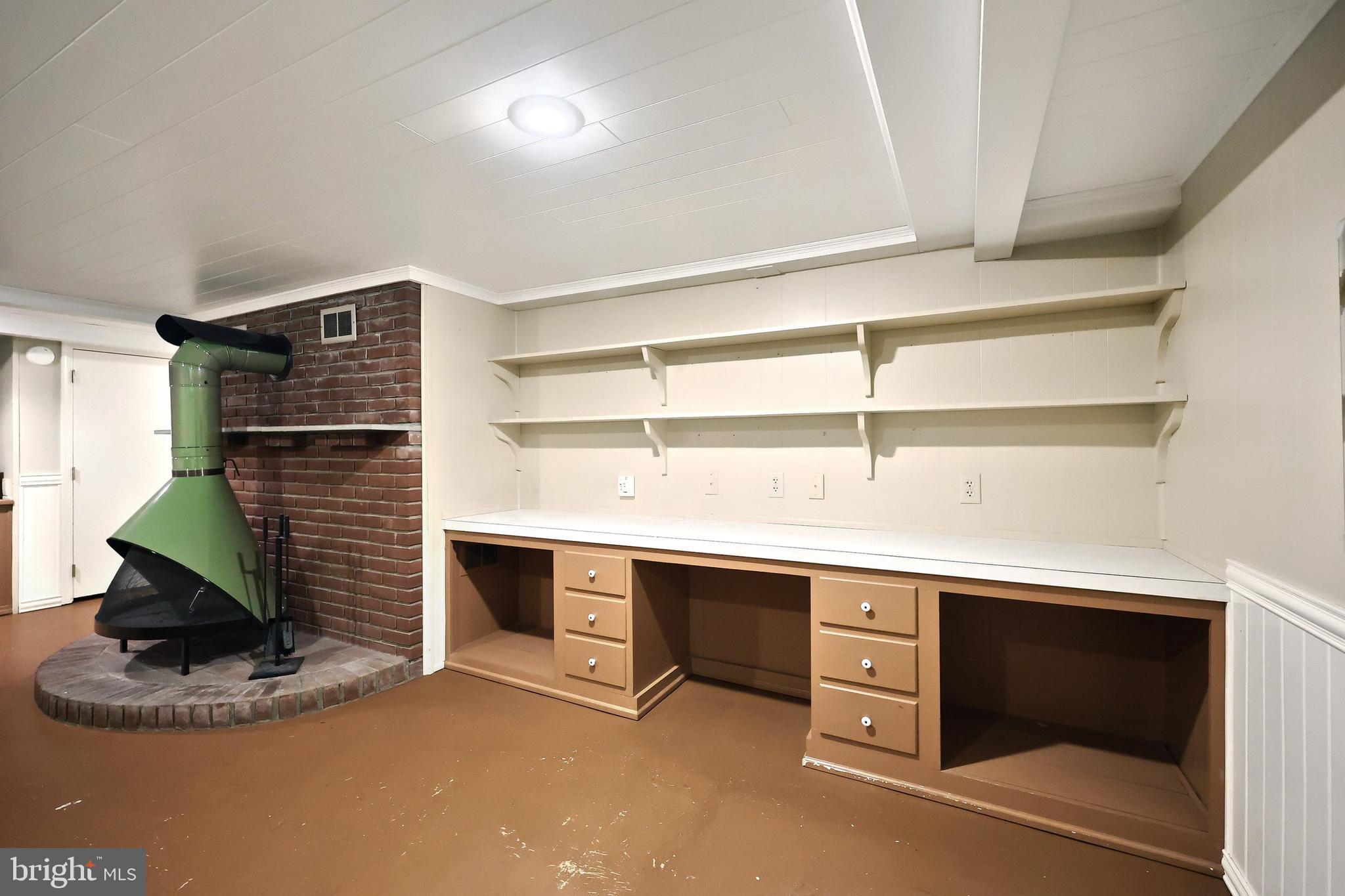 99 5th Street Hanover, PA 17331 - Photo 34 of 38 a room with a desk and closet