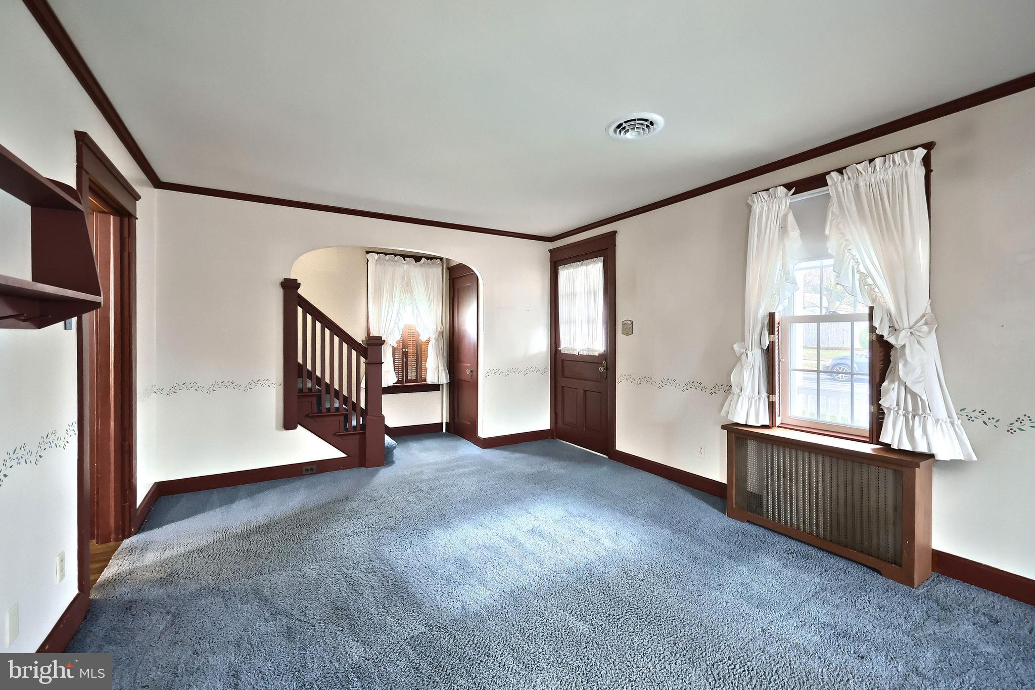 99 5th Street Hanover, PA 17331 - Photo 9 of 38 an empty room with windows and closet