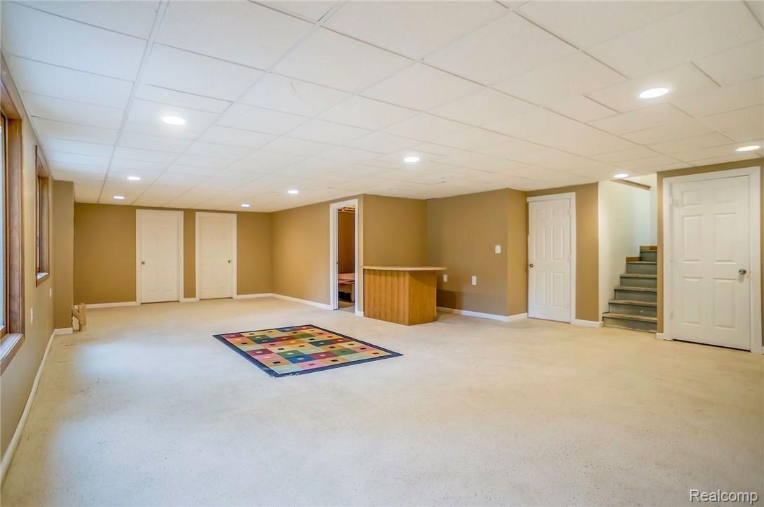 7695 Teahen Road Brighton, MI 48116 - Photo 19 of 27 Very large basement has so much potential.