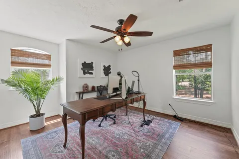 an aerial view of a house with a outdoor space