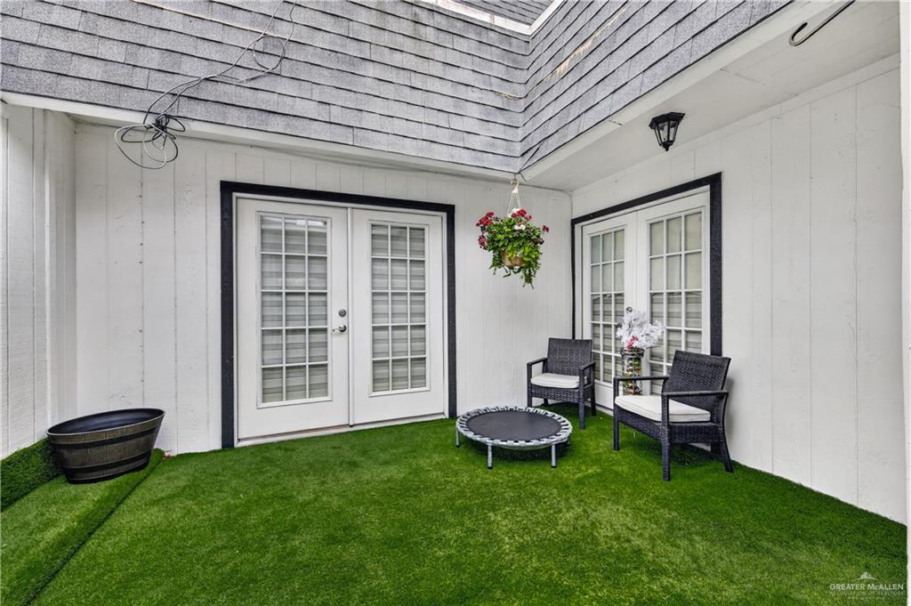 500 Wichita Avenue McAllen, TX 78503 - Photo 21 of 22 a view of a patio with table and chairs and potted plants