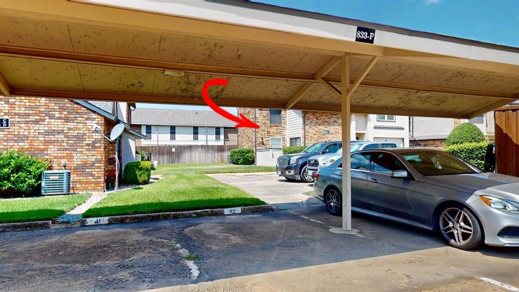 833 West Harwood Road, Unit F Hurst, TX 76054 - Photo 39 of 40 Covered carport just across from the unit - PLUS an attached garage!