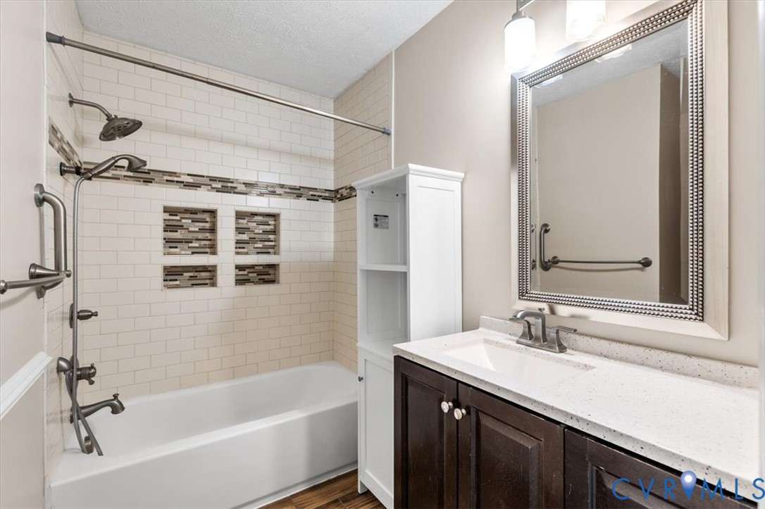 1437 Palmore Road Powhatan, VA 23139 - Photo 25 of 60 Bathroom featuring a tub/shower combination with s