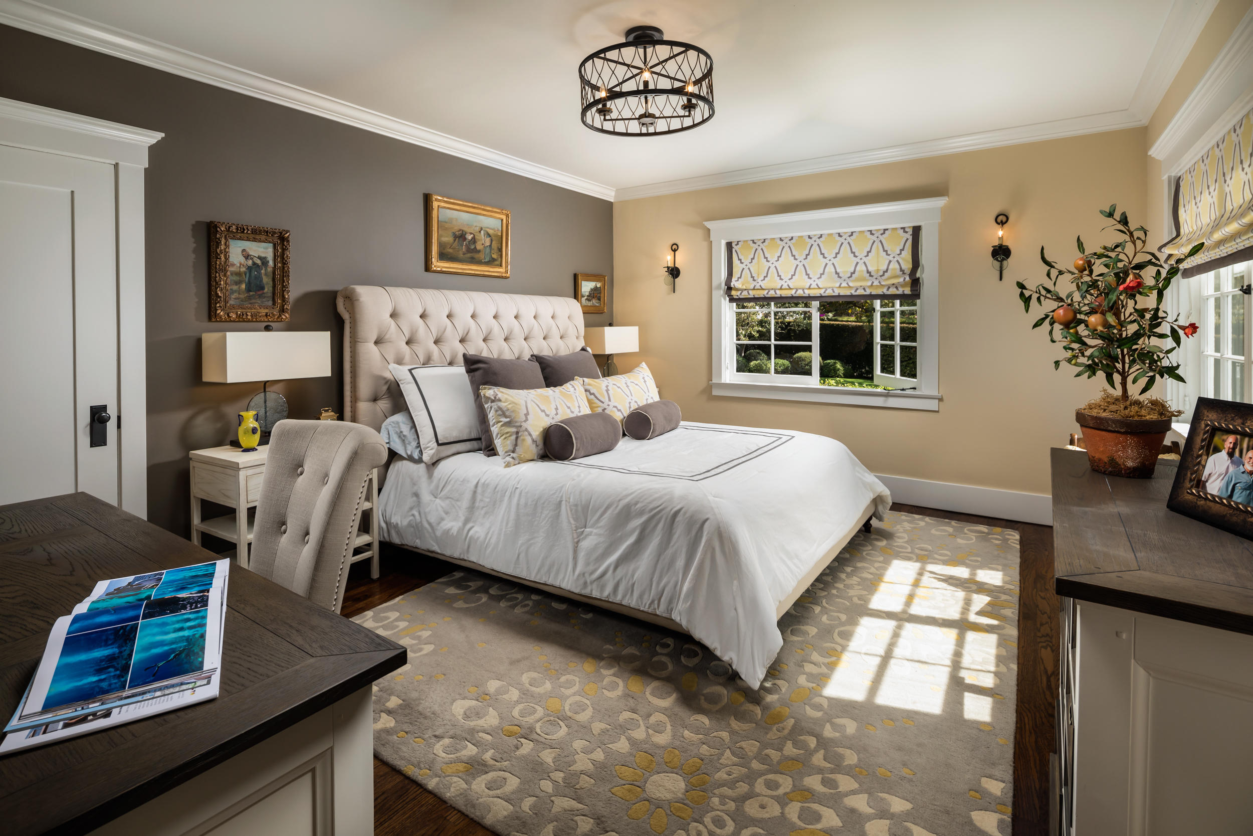 199 Ocean View Avenue Carpinteria, CA 93013 - Photo 16 of 19 a bedroom with a bed window and potted plant