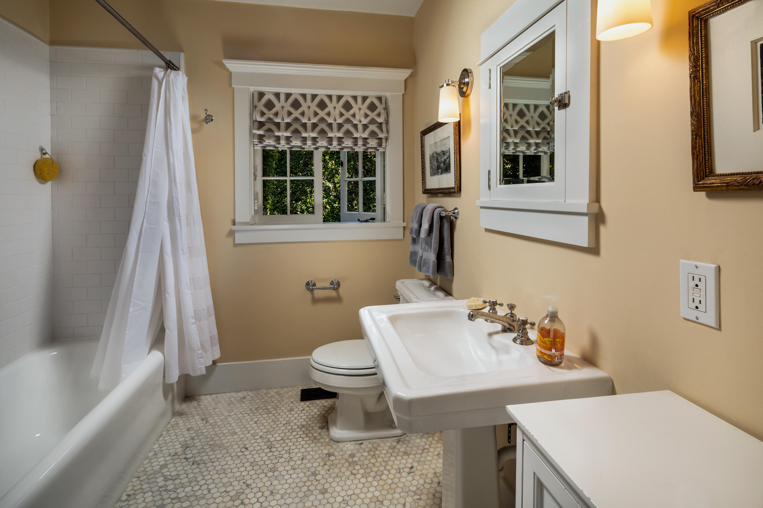 199 Ocean View Avenue Carpinteria, CA 93013 - Photo 19 of 19 a bathroom with a sink toilet and shower