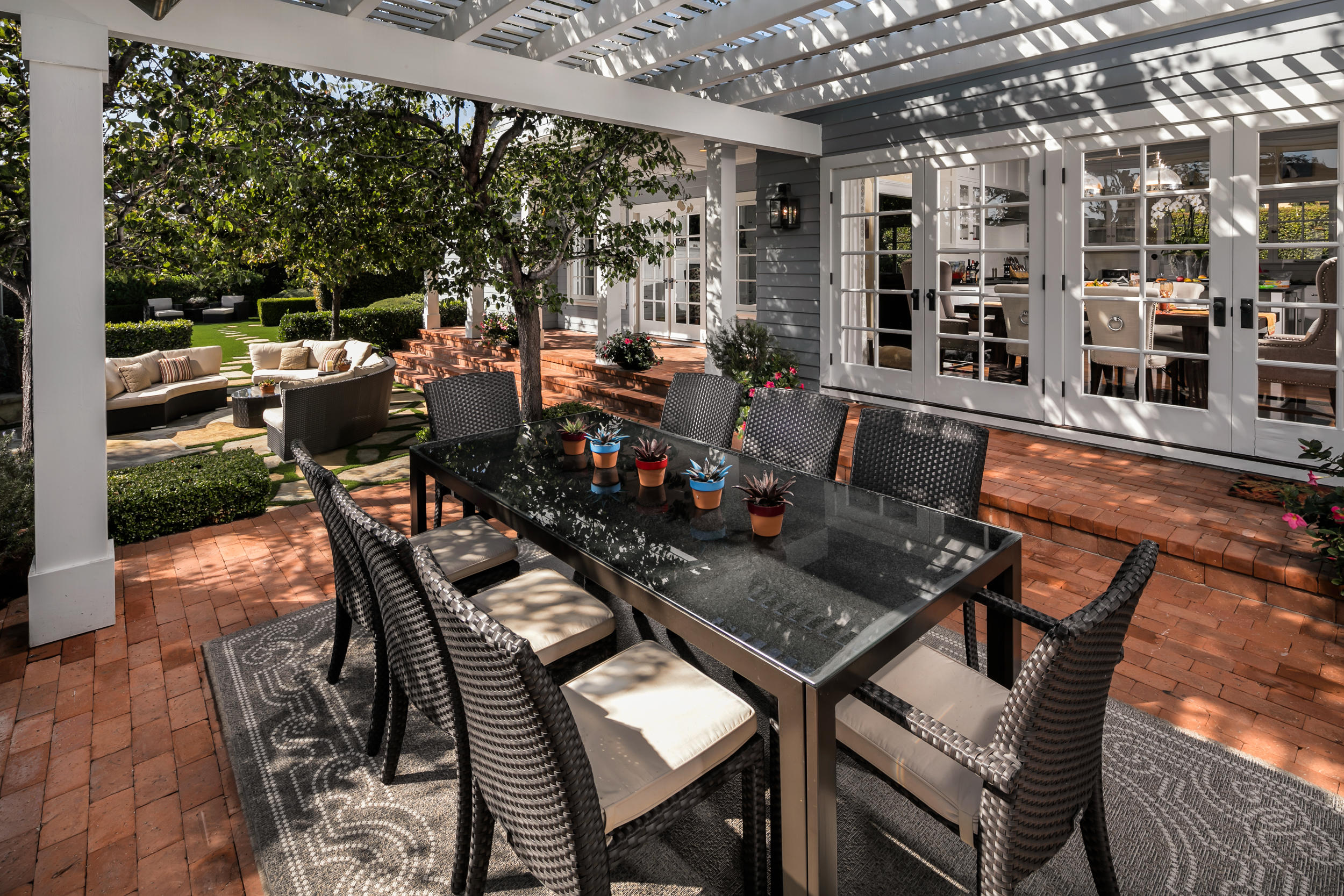 199 Ocean View Avenue Carpinteria, CA 93013 - Photo 3 of 19 a view of a chairs and table in the patio