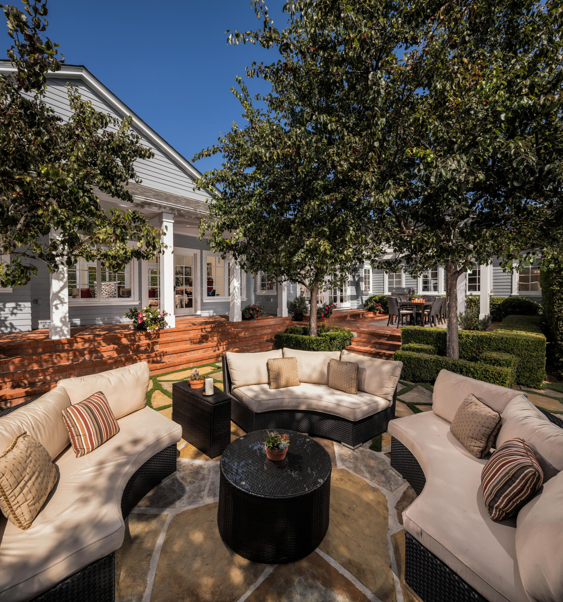 199 Ocean View Avenue Carpinteria, CA 93013 - Photo 6 of 19 a view of a patio with couches and a fire pit