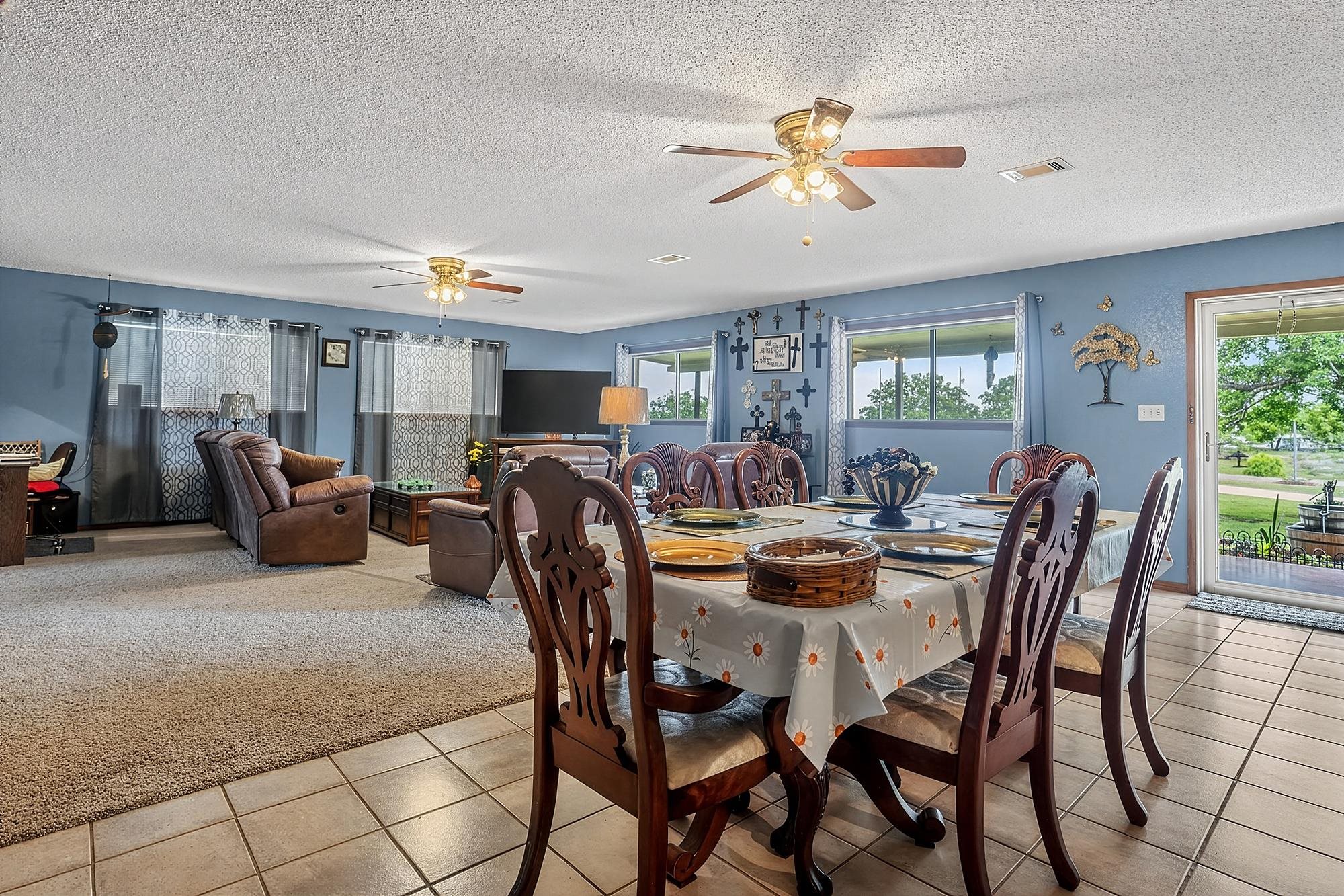 10465 Ranch To Market 1431 Buchanan Dam, TX 78609 - Photo 15 of 29 a view of a dining room with furniture