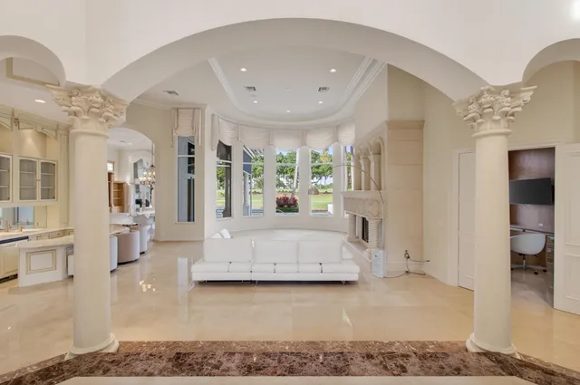 a kitchen with stainless steel appliances granite countertop a sink and a stove