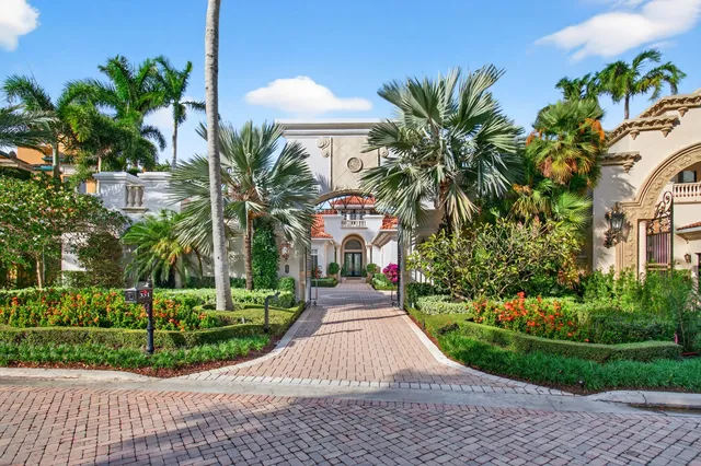 a front view of a house with yard