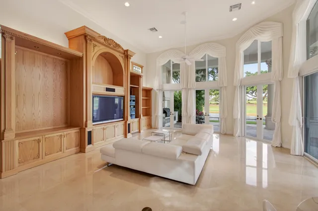 a view of a swimming pool with a patio