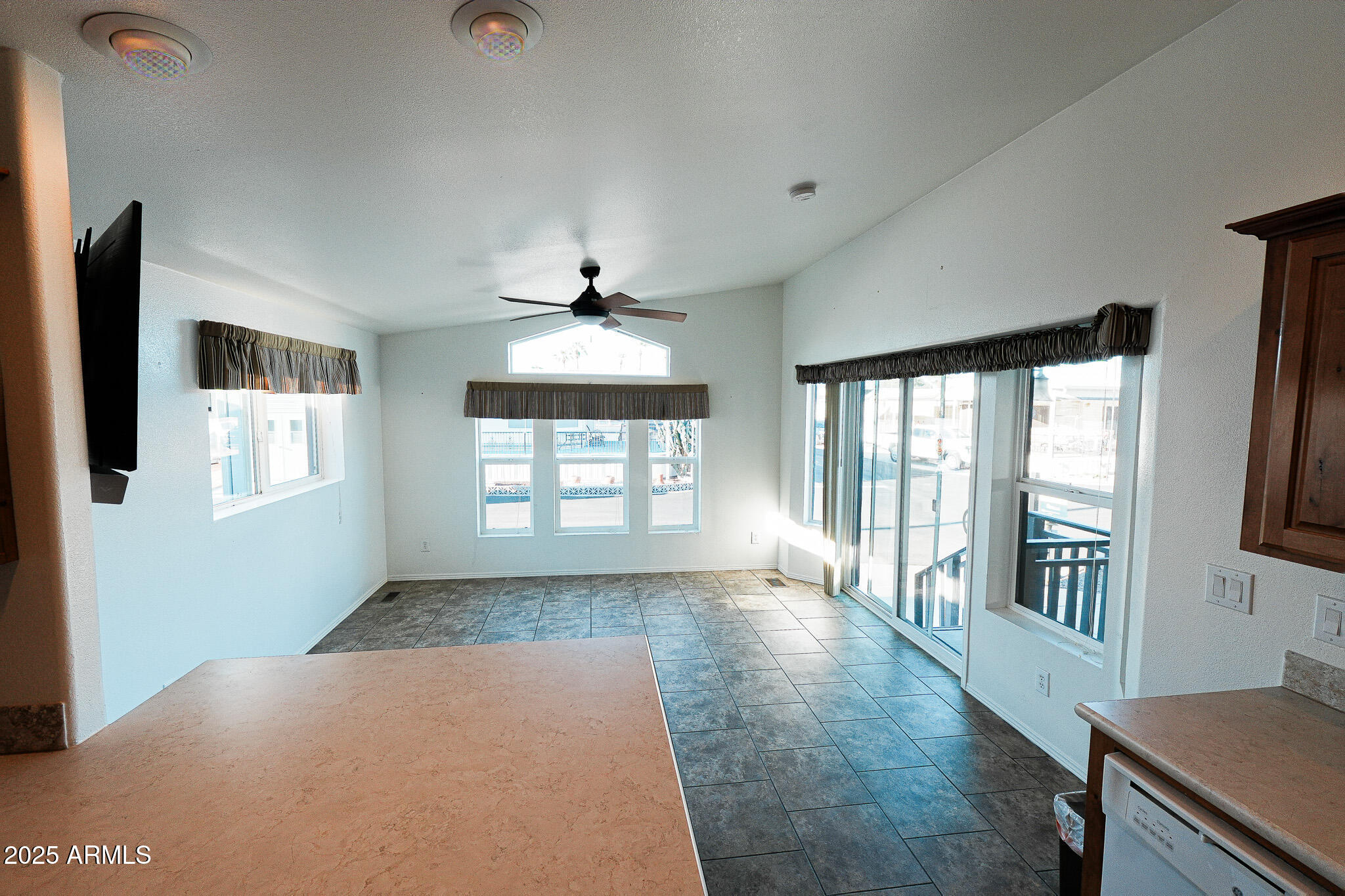 17200 West Bell Road, Unit 330 Surprise, AZ 85374 - Photo 12 of 39 a view of an empty room with a window