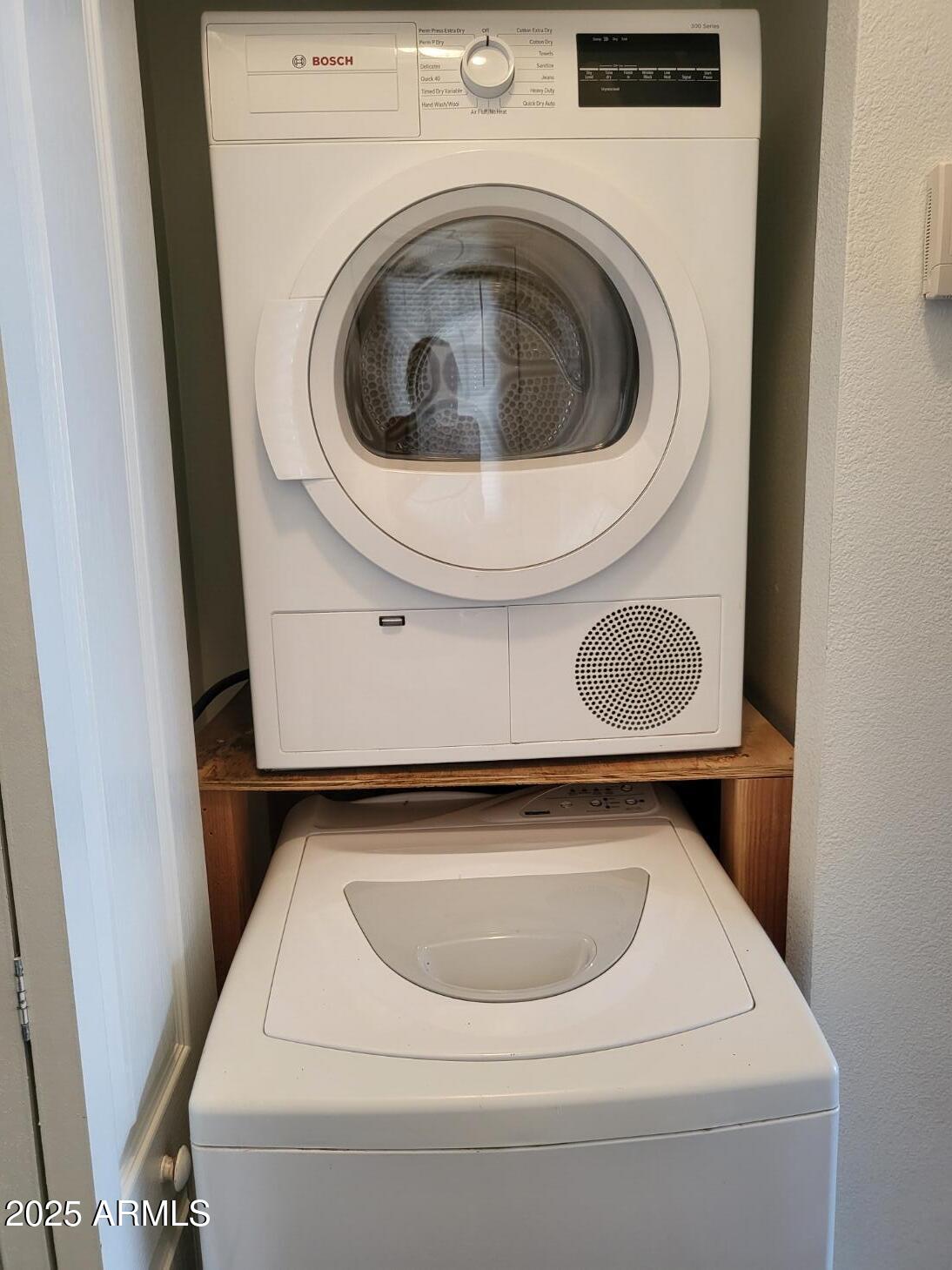 17200 West Bell Road, Unit 330 Surprise, AZ 85374 - Photo 23 of 39 a utility room with dryer and washer
