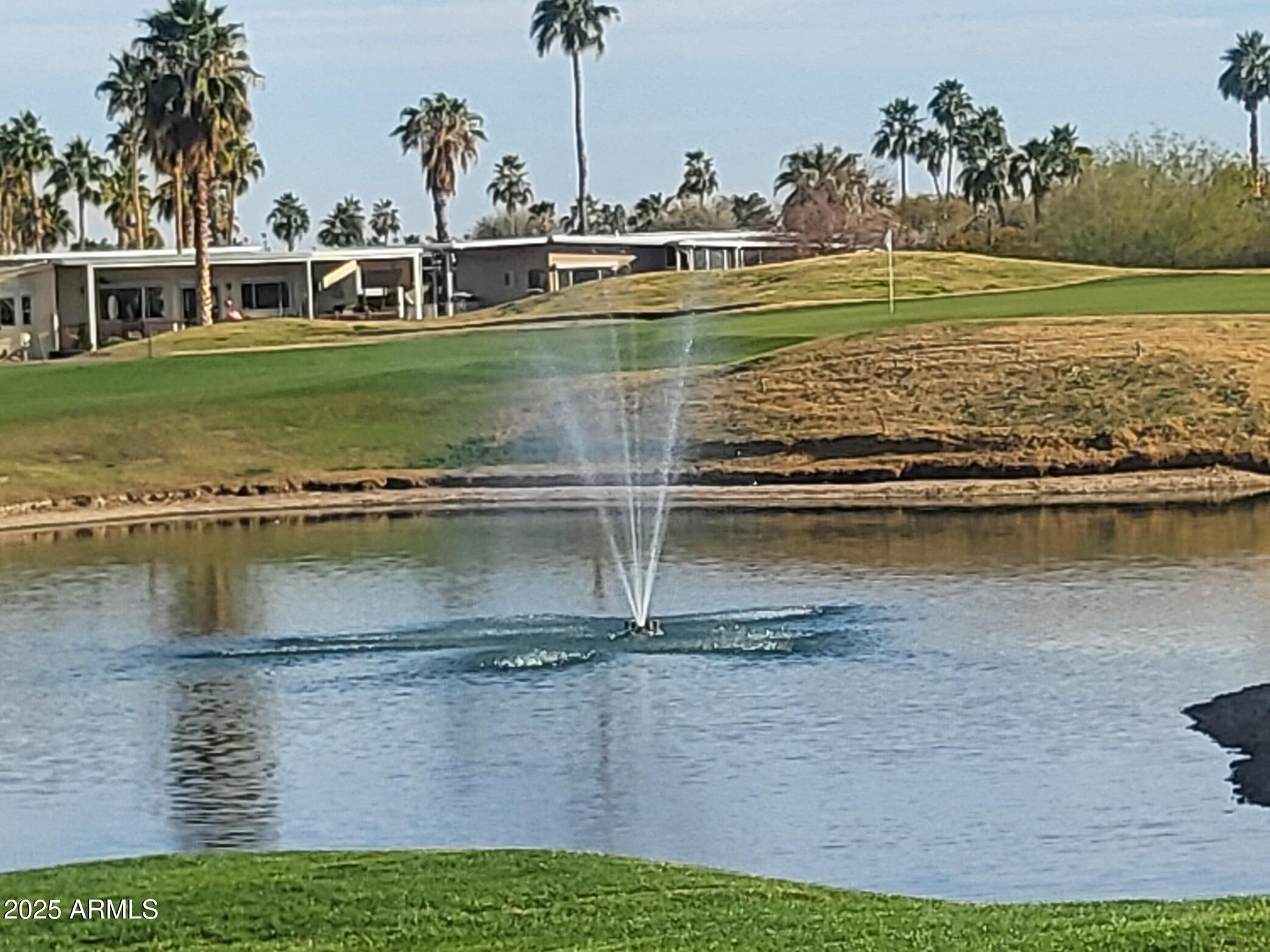 17200 West Bell Road, Unit 330 Surprise, AZ 85374 - Photo 25 of 39 a view of a water with beach